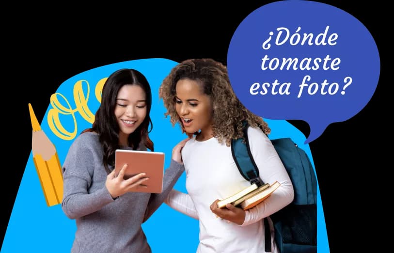 Due donne in età scolare usano insieme Rosetta Stone, dove si legge ad alta voce "Donde tomaste esta foto?"